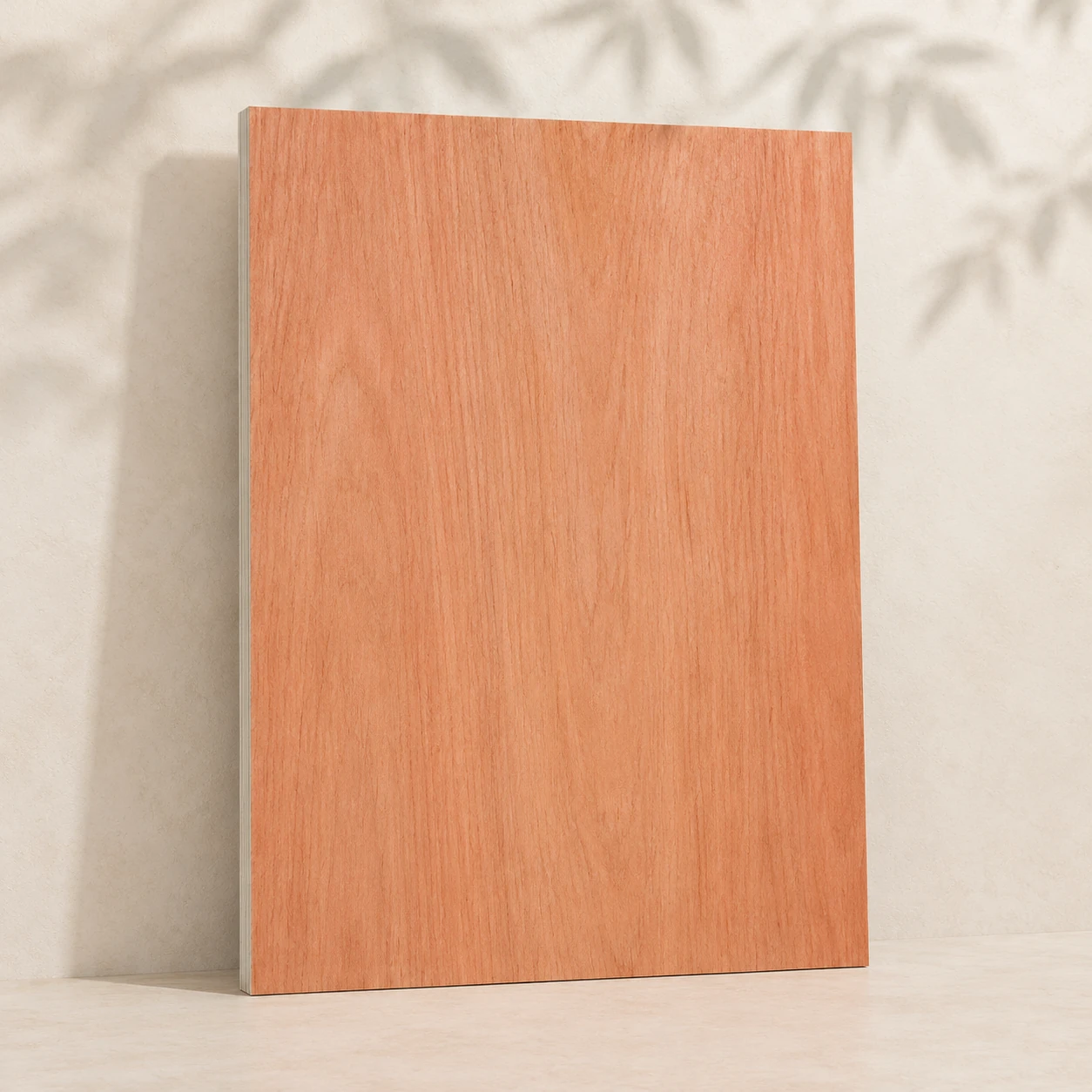 Whole sheet of bintangor-faced plywood with a reddish-brown face and fine ribbon grain